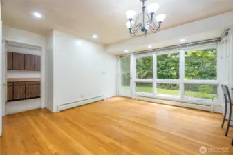 There is an additional dining area/breakfast nook in the kitchen area, with the laundry room beyond.