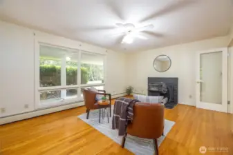 This warm and welcoming space with hardwood floors could make a den, office or additional bedroom.