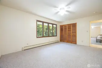 This room is also very large and looks out over the back of the home.