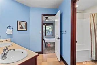 Joining two bedrooms, this jack & jill bathroom is a full bath with double sinks