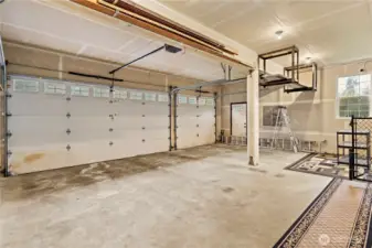 Generous 3-car space with extra high ceilings for storage