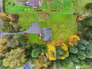 This over 2.8 acre space has lots of 'field space' as well as woods to explore