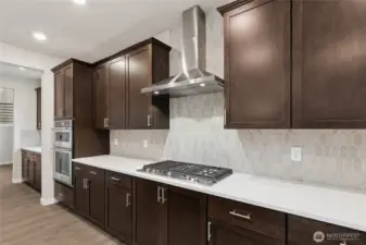 Kitchen with walk through Butler's pantry leading into formal dining with 20' ceilings and walls of windows! Home will include white cabinetry