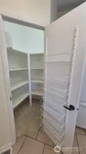 Kitchen walk-in pantry.