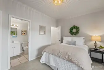 Photo of one of the identical 2 En-Suites on the lower level. Each has a door to the patio outside, a walk-in closet and full bath