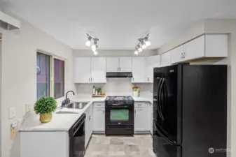 All new white cabinetry with satin nickel hardware.