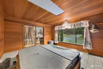 Hot Tub Room off Great room, primary bedroom and Garage