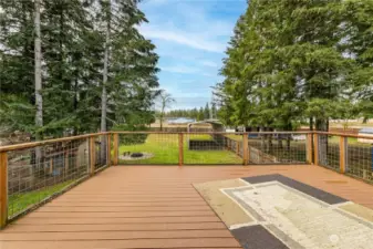 Primary Bedroom Deck over looking the backyard.