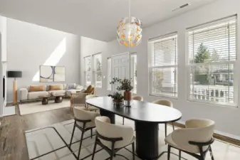 Formal dining room and sitting area on main. Virtually Staged