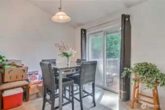 Eating area off kitchen, leads to deck