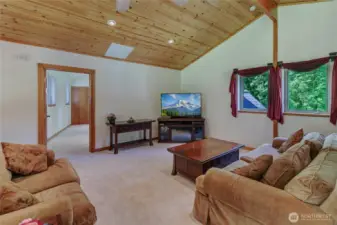 Upstairs loft area. Bedrooms located on each side. New carpet in this room, as well as the rest of the home.