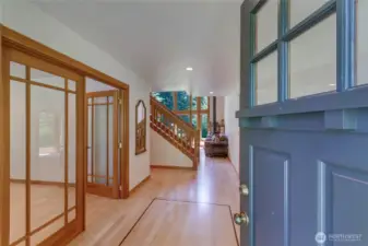 Front entry welcomes you to refinished hardwood floors.