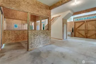 Barn/shop has 3 large access doors.