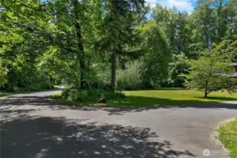 View of first driveway entrance. Driveway is on the right.