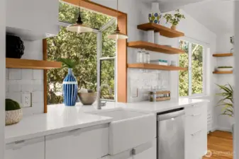 Stunning kitchen remodel! Zellige tile, apron sink, floating shelves