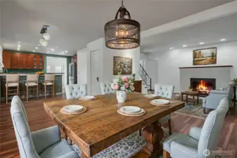 Virtually staged dining area (light fixture over table also virtually staged).