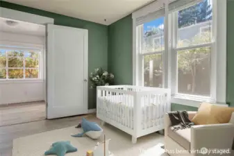 Second bedroom on the main floor -- perfect for a nursery, home office, exercise room, You're only limited by your imagination!