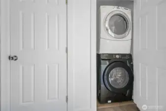 Laundry area is conveniently located off the kitchen.