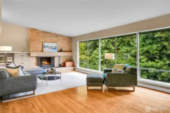 Floor to ceiling windows bring the outdoors in along with the natural light.
