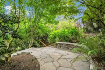 Step down from deck to this lovely Bluestone patio.