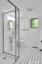 Stylish three quarter bath.