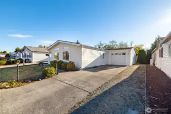 Attached garage is extra deep and will accommodate most vehicles.