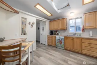 Eat-in kitchen, looking toward the entry.