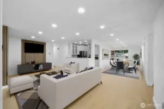 Virtually staged. Easy flow from the kitchen to the family area.