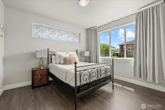 Second primary bedroom, or a spacious & bright office.