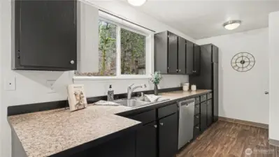 Kitchen with practical counterspace for meal prep.