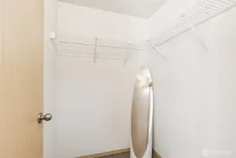 Walk in closet in the primary suite. There's a second closet in this room as well.