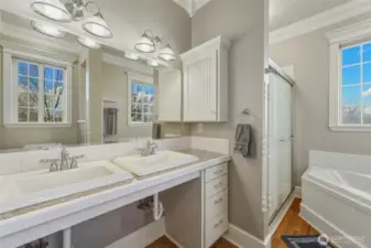 Primary Ensuite w/ Shower & Garden Tub - Main Floor