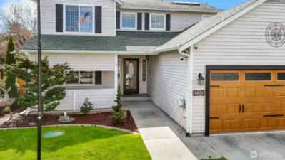 A comfortable, covered entry that makes coming and going easy—rain or shine