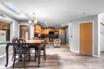Natural light from the skylight and backyard-facing windows keeps the space feeling bright and open
