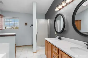 Plenty of room to get ready without feeling crowded, with dual sinks and a separate shower