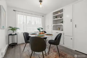 Large dining room full of vintage charm, complete with original built-ins that add both character and function.