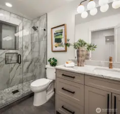 Additional bath on lower level serves 4th bed- makes a fantastic guest suite!