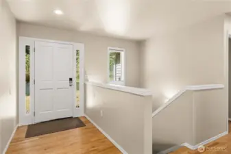 Inviting entry with warm natural light.