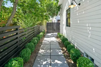 This charming pathway from the second home's back door to the patio puts you in just the right mood to relax.