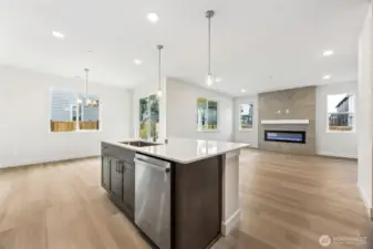 Kitchen island looking back at great room and dining