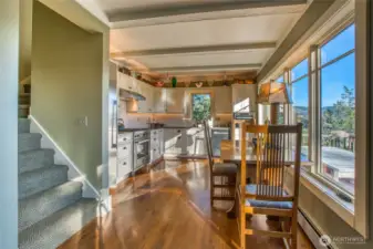 Stairs lead to the upper level bedroom.