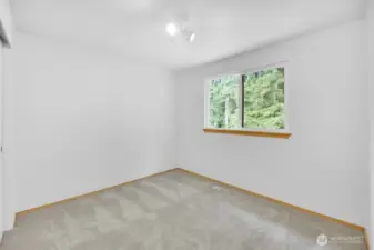 There are four bedrooms upstairs in total. This bedroom is #1 on the second floor.