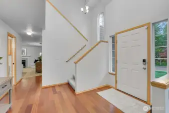 Vaulted ceilings in the entrance brings in natural light and a grand feel.