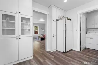 View of kitchen to living room and utility room~