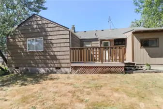 Back deck is easily reached from the kitchen via the laundry/mud room—great for outdoor dining!
