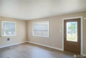 Enjoy easy-care, stylish new flooring in this comfortable living space.