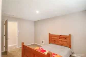 Perfectly sized bedroom ideal for restful nights or a home office.