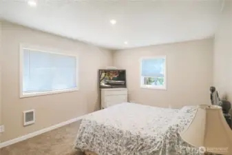 Well-sized bedroom offers flexibility for guests, work, or just a good nights sleep.