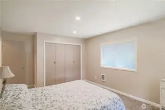 Comfortable and bright bedroom with generous closet space.