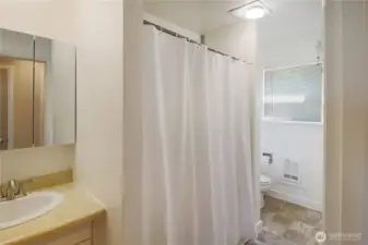 Functional full bath with classic style, conveniently located near all bedrooms.